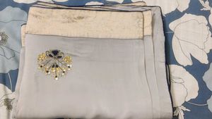 Grey saree with gold border