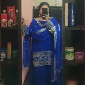 Royal Blue Embroidered sharara suit with dupatta.