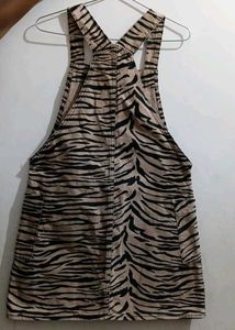 pinafore dress, featuring a zebra print 🦓🐅
