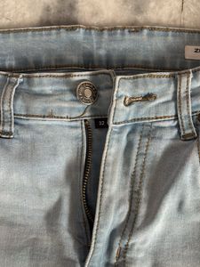 Distressed Denim Jeans