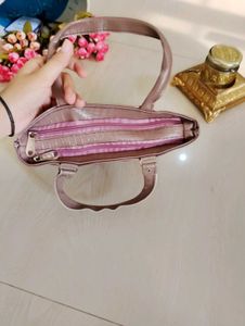 3. Pinkish Beige Handbag