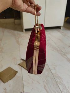 Maroon Printed Leaf Hand Clutch With Sling