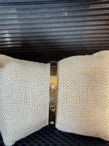 free size Gold-tone Bangle with Gemstones