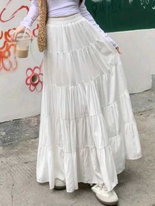 A Combo Of Pink Dress White Skirt nd Brown Shirt