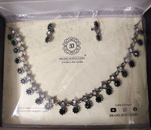 A Set Of Neckpiece With Earrings