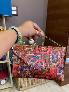 Sling Cum Clutch