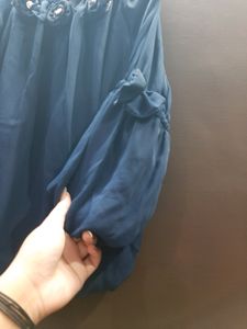 Off Shoulder Ballon Top With Bows On Sleeves.