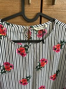 A Black Nd White Striped Formal Top