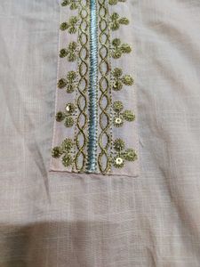Elegant Peach Kurti with Intricate Golden Embellis