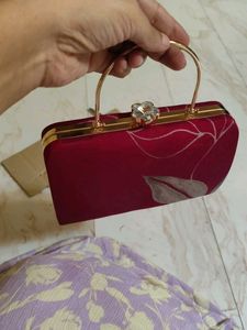 Maroon Printed Leaf Hand Clutch With Sling