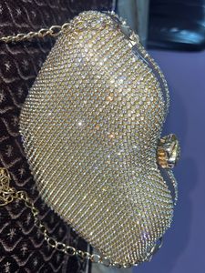 Metro Glamorous Gold-toned Clutch