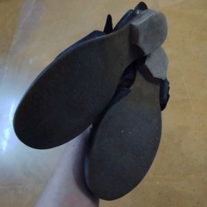 Black flat closed toe sandals