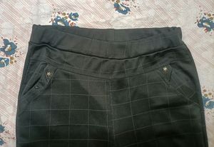 Black stretchable pants can fit 30,32,34 waist