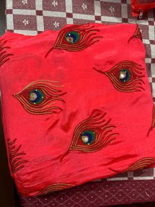 Elegant Pink Sari with Peacock Design