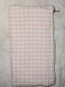 It&#39;s  Pink and white Pouch !