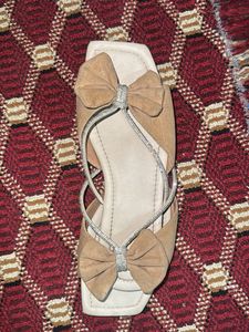 Bow Detail Slides
