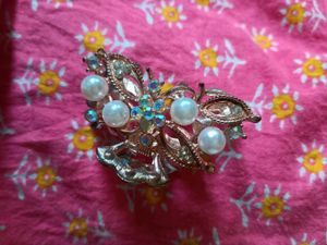 Cute butterfly earings and heavy clutch combo