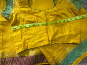 Elegant Bright Yellow Saree with lotus motifs
