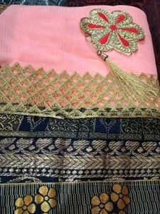 Elegant Peach Saree with Floral Border
