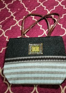 Jut Handbag