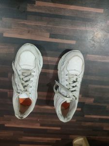 2 Pair Of White Shoes