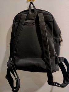 Black Backpack with Charm Detail