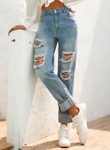 Women’s High Rise Ripped Blue Jeans