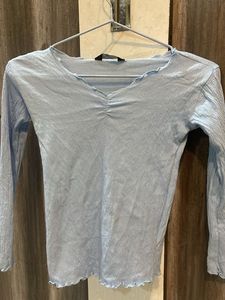 Light blue colour skin fit top