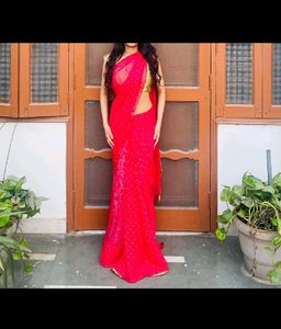 Pink Saree with Gold Blouse