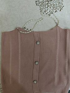 Pink top with pearl strip