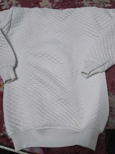White Sweatshirt With Patchwork.