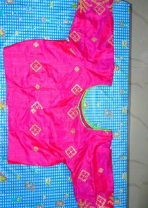 Parrot green saree with boat neck pink blouse