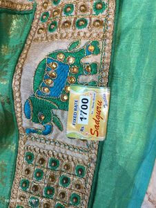 Elegant Green Silk Saree with Elephant Border