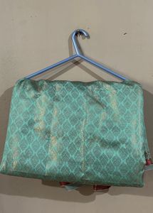 Aqua Blue Saree With Pink Little