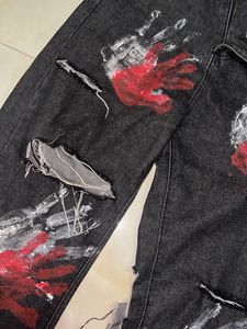 Distressed Handprint Jeans