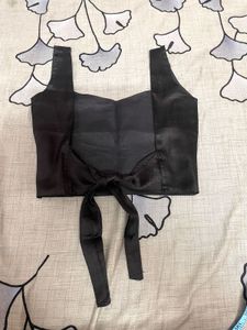 backless black blouse