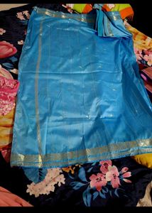Woman Silk saree with stitched blouse