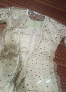brown gown with net shrug