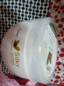 dove body love silky pampering body cream. unused. and new