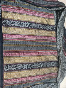 black Saree with beautiful patterns