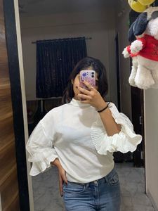 white top with net baloon sleeves