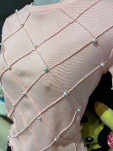 Pearl Lattice Ruffle Knit Top