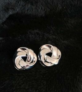 Silver Toned Spiral Curved Earings - 1 Pair
