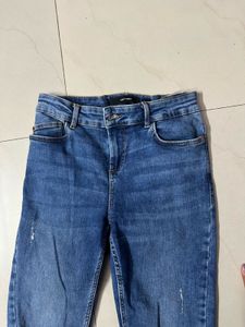 Ripped Knee Denim Jeans