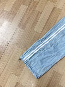 Baggy Side-Striped Denim Jeans.