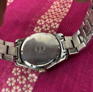 Titan Steel Analog Watch for men.