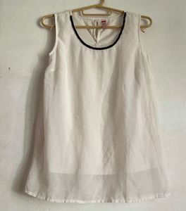 White Sleeveless Top