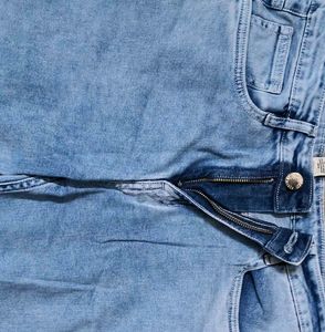 Ripped Blue Denim Jeans