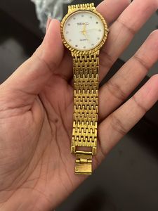 Quartz Ladies Golden Metal Strap Watch