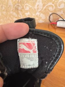 Puma  High-Top Sneakers